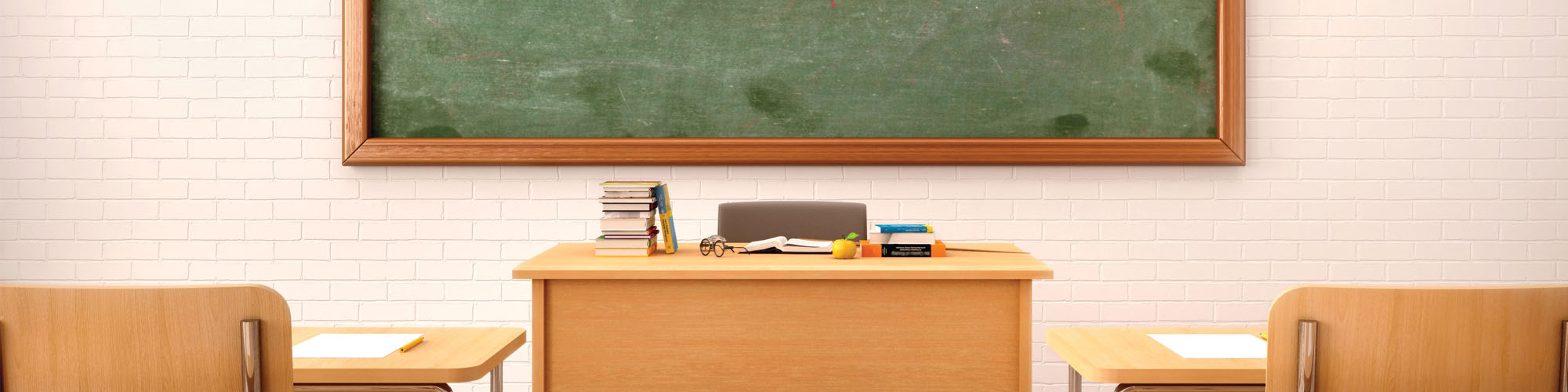 school classroom with teachers desk and blackboard