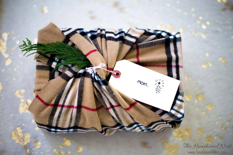 christmas gift wrapped with scarf