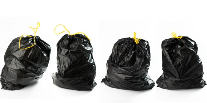 Four full garbage bags