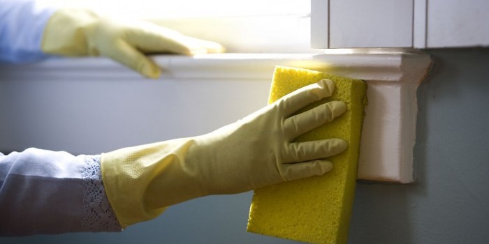 cleaning trim with a sponge