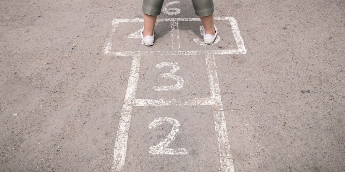 PLAYGROUND hop scotch kids playing