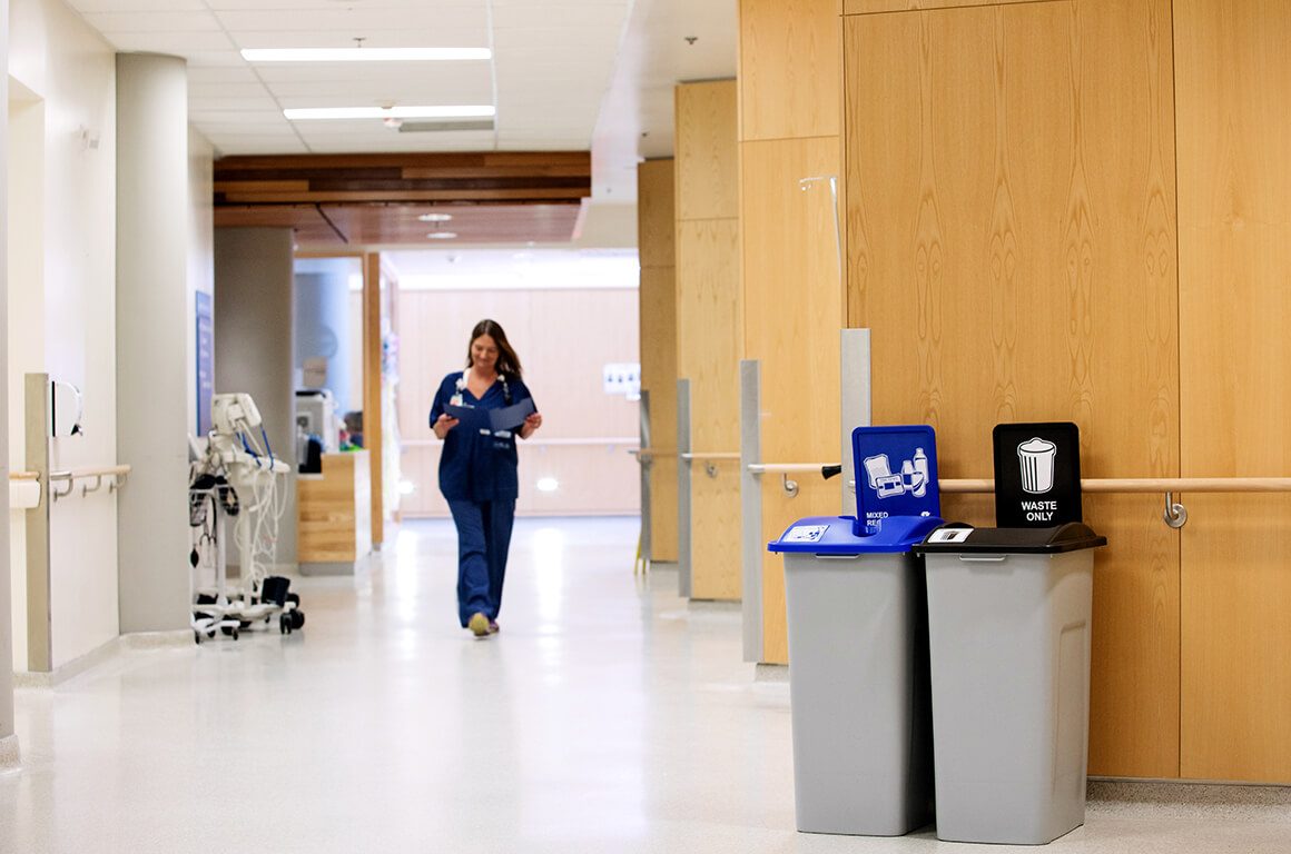 Recycling bins in hospital hallway