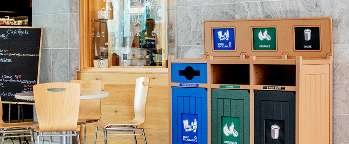 Aspyre triple bins above bin signage