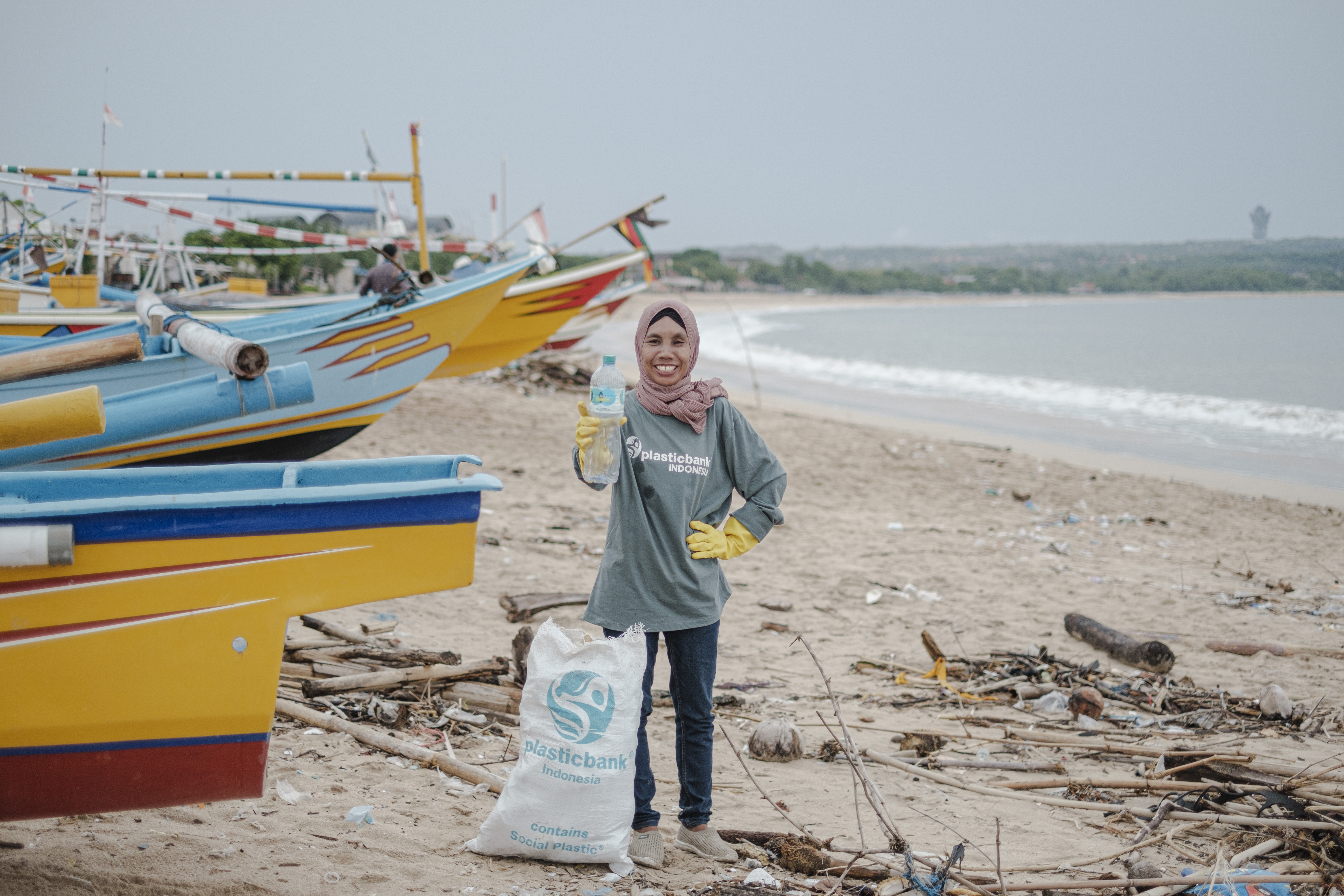 Atmawati cleans up the Balangan Beach in Bali. Photo courtesy of Plastic Bank