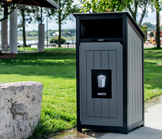 Busch Systems Aspyre Collection Aura Series single in black and grey in a city park outside