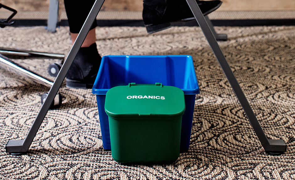 Busch Systems Deskside Recycler container in blue with green organics hanging waste basket attached