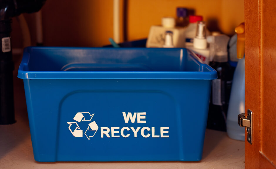 Busch Systems Deskside Recycler container in blue with mobius loop we recycle graphic