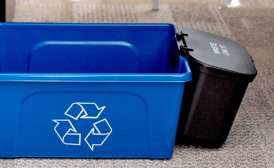 Busch Systems Deskside Recycler container in blue with mobius loop graphic and black hanging waste basket