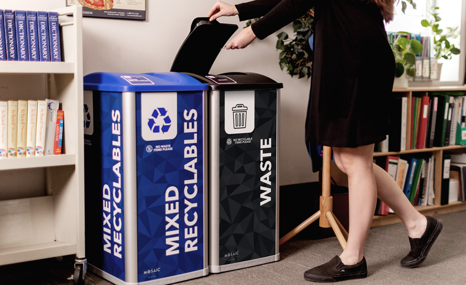 Mosaic Series mixed recyclables and waste containers with stock signs in school classroom