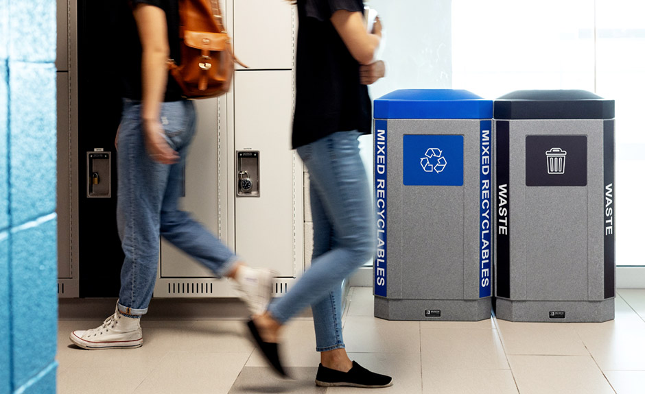 Busch Systems Octo Series Indoor Waste and Recycling Containers in high school hallway