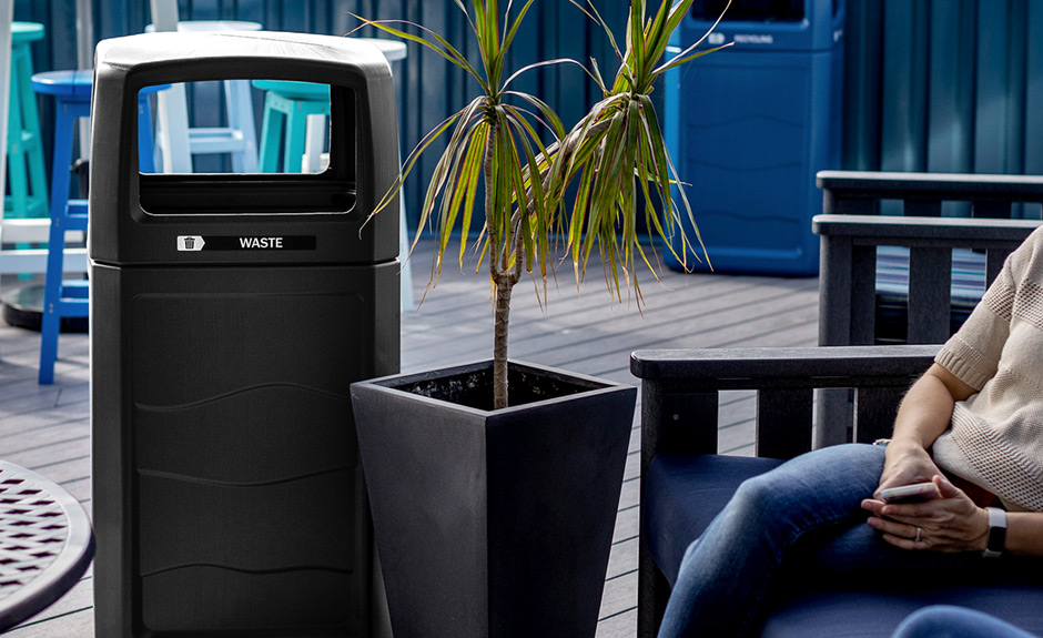 Busch Systems Renegade Series waste bin at outdoor patio