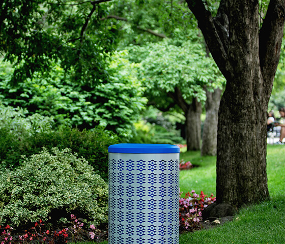 Busch Systems Berkeley outdoor recycling container with blue lid and liner