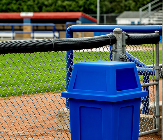Busch Systems blue Sentry single bin at a baseball diamond