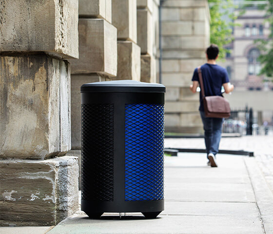 Busch Systems Toronto container with blue and black liners showing through mesh-like exterior and black standard lid