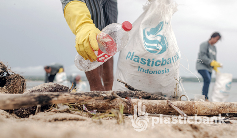 People picking up plastic waste