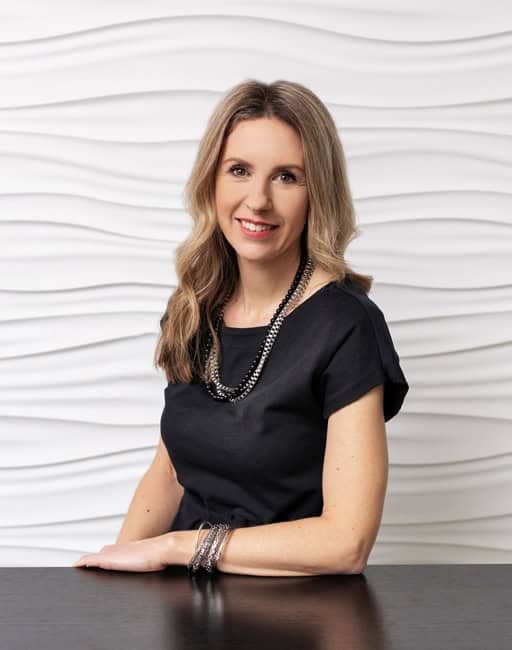 blonde woman smiling