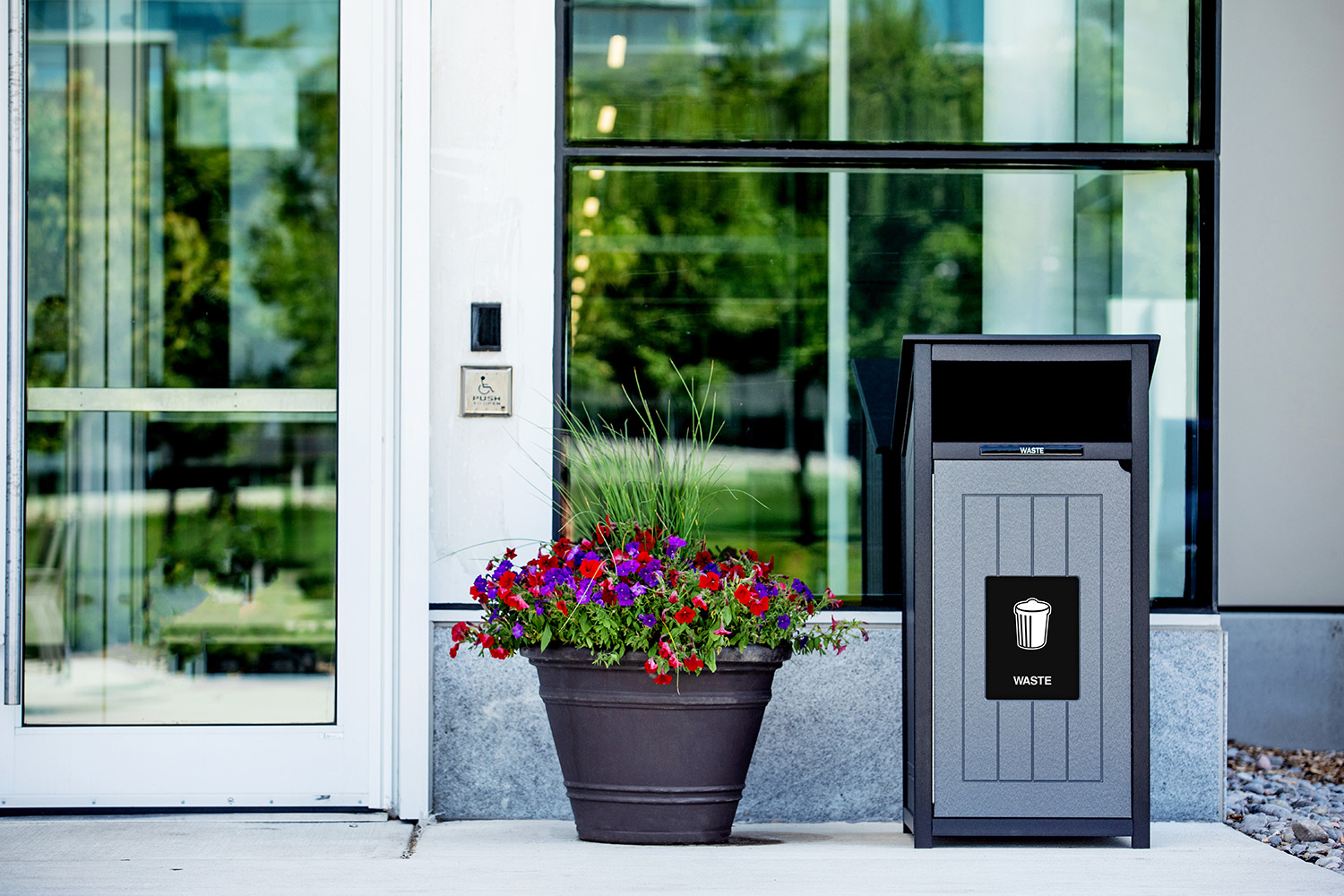 Waste bin next to flowers