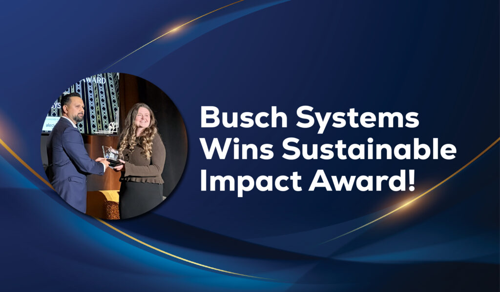 Award presentation photo announcing that Busch Systems wins the Sustainable Impact Award