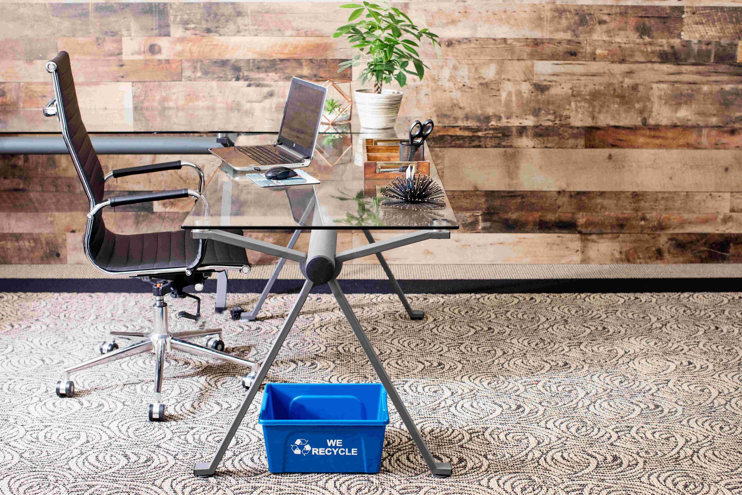 Blue Deskside Recycling Container in an office setting
